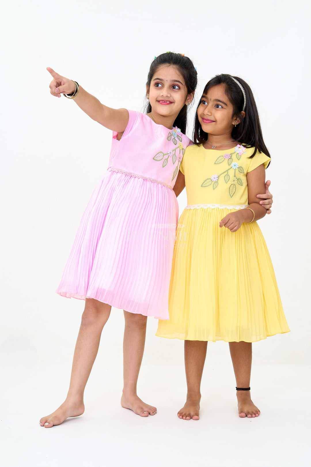 The Nesavu Girls Fancy Party Frock Girls Poly Georgette Frock in Sunshine Yellow with Floral Embellishments and Pleats Nesavu Girls Poly Georgette Frock Sunshine Yellow Floral Appliqu Weddings | The Nesavu