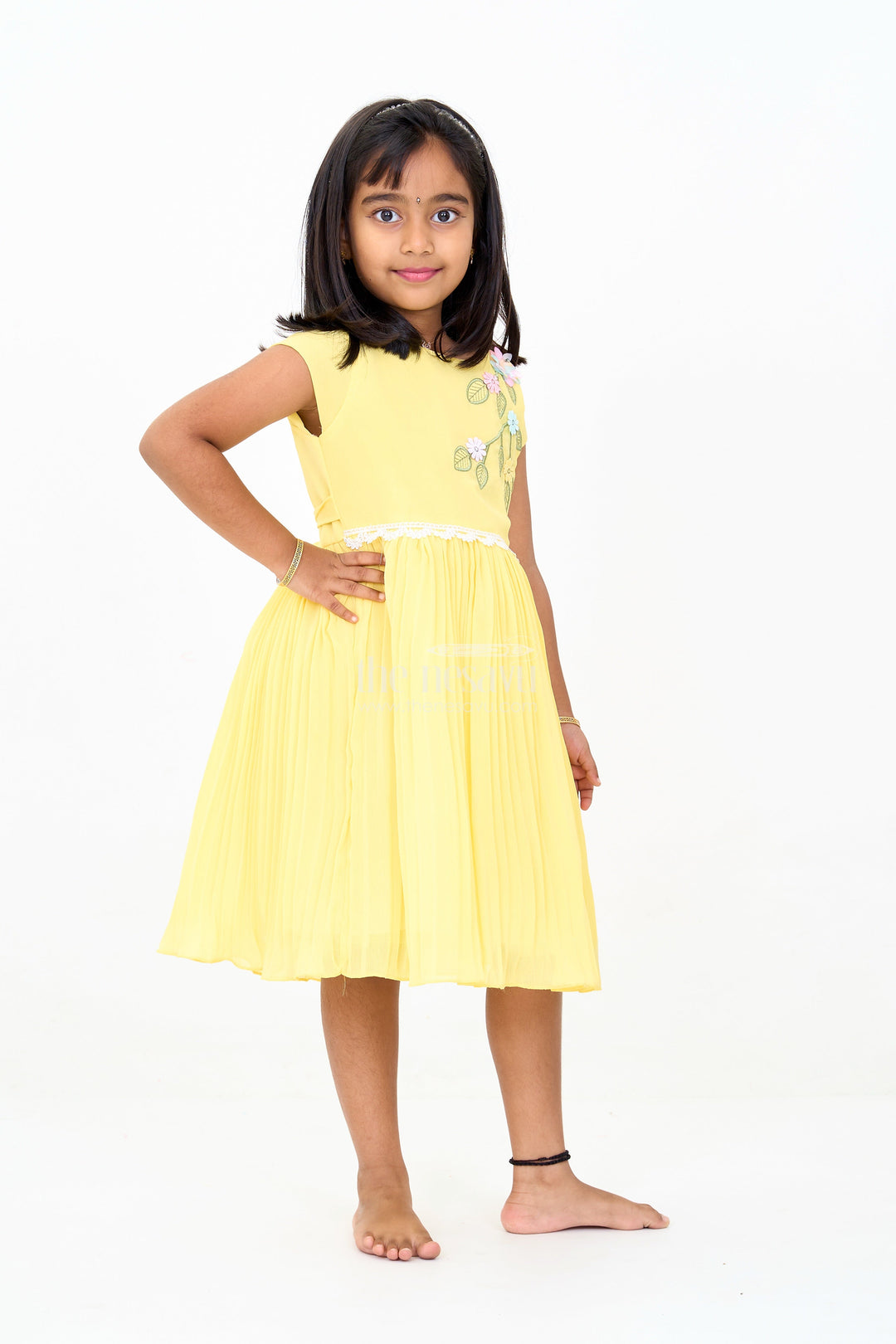 The Nesavu Girls Fancy Party Frock Girls Poly Georgette Frock in Sunshine Yellow with Floral Embellishments and Pleats Nesavu Girls Poly Georgette Frock Sunshine Yellow Floral Appliqu Weddings | The Nesavu
