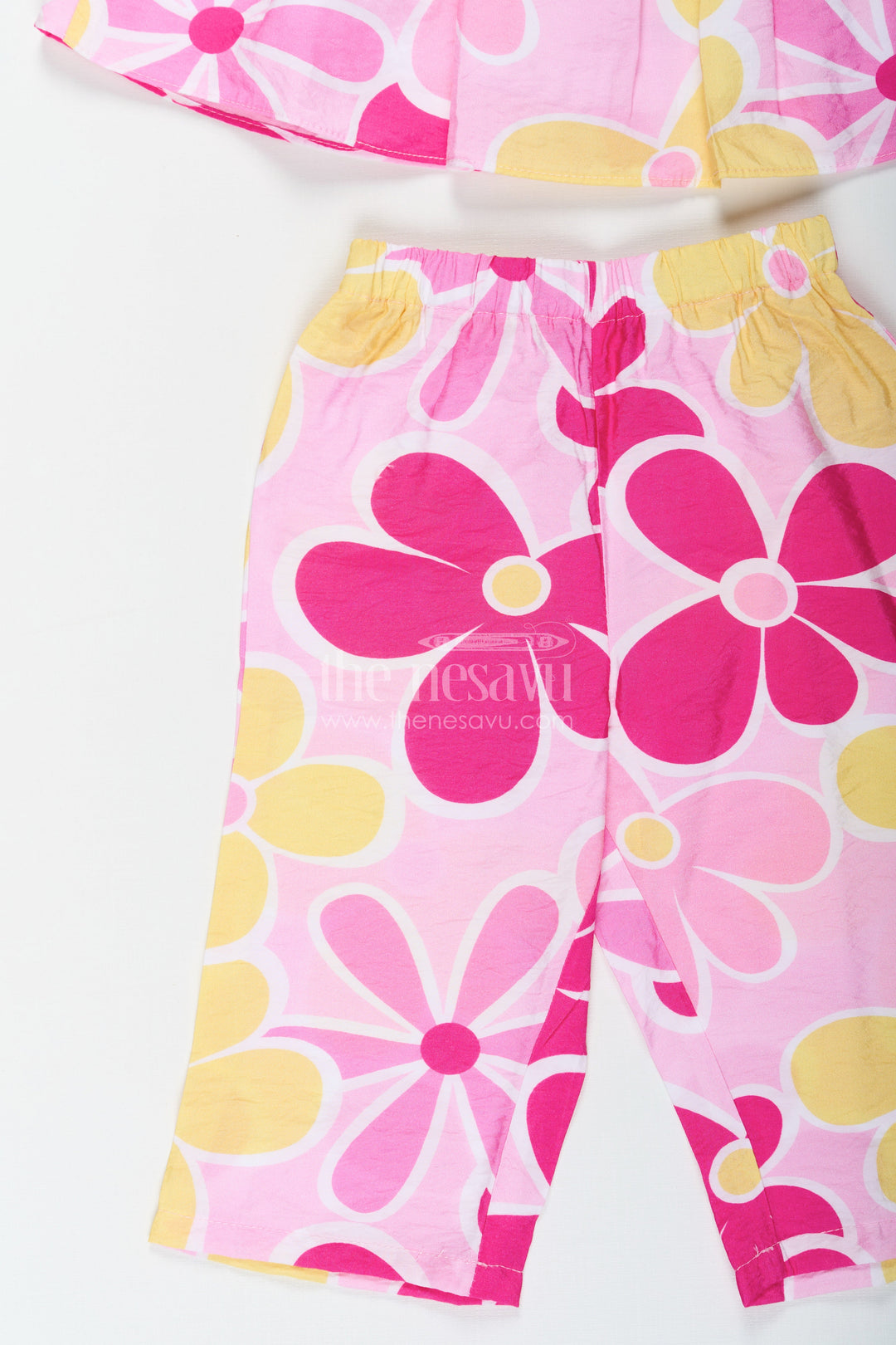 The Nesavu Girls Casual Set Girls Printed White Top with Matching Floral Pant Set in Bright Cotton Fabric Nesavu Girls Printed White Top Set with Floral Cotton Pants in Yellow and Pink Hues | The Nesavu