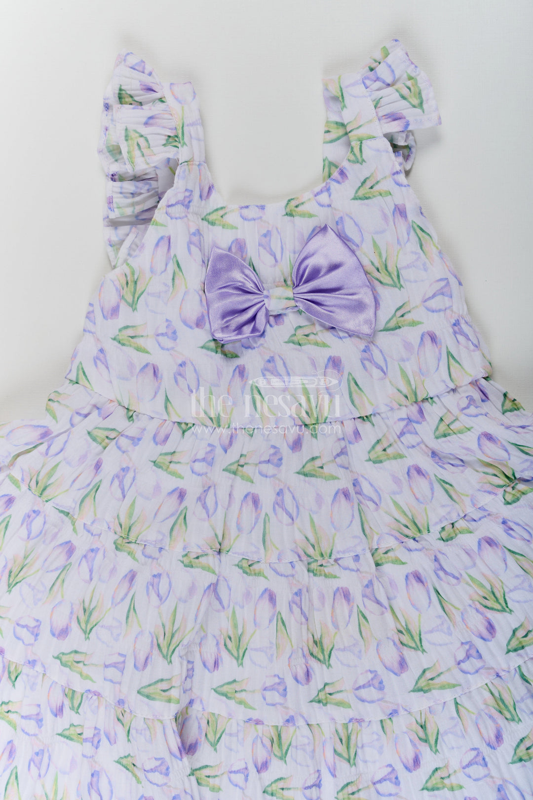 The Nesavu Baby Cotton Frocks Girls Purple Floral Frocks with Sleeves in Chiffon Featuring Layered Ruffles and Bow Detail Nesavu Girls Purple Floral Printed Chiffon Frocks Sleeves Layered Ruffles | The Nesavu