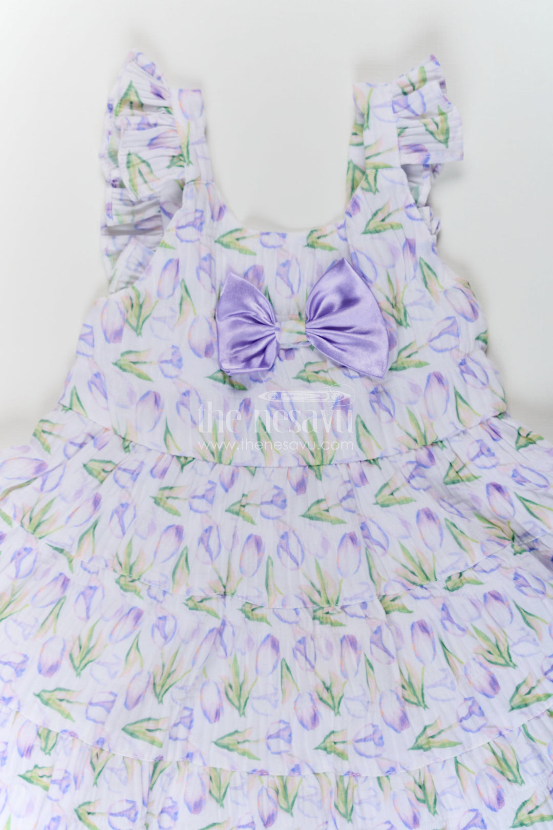 The Nesavu Baby Cotton Frocks Girls Purple Floral Frocks with Sleeves in Chiffon Featuring Layered Ruffles and Bow Detail Nesavu Girls Purple Floral Printed Chiffon Frocks Sleeves Layered Ruffles | The Nesavu