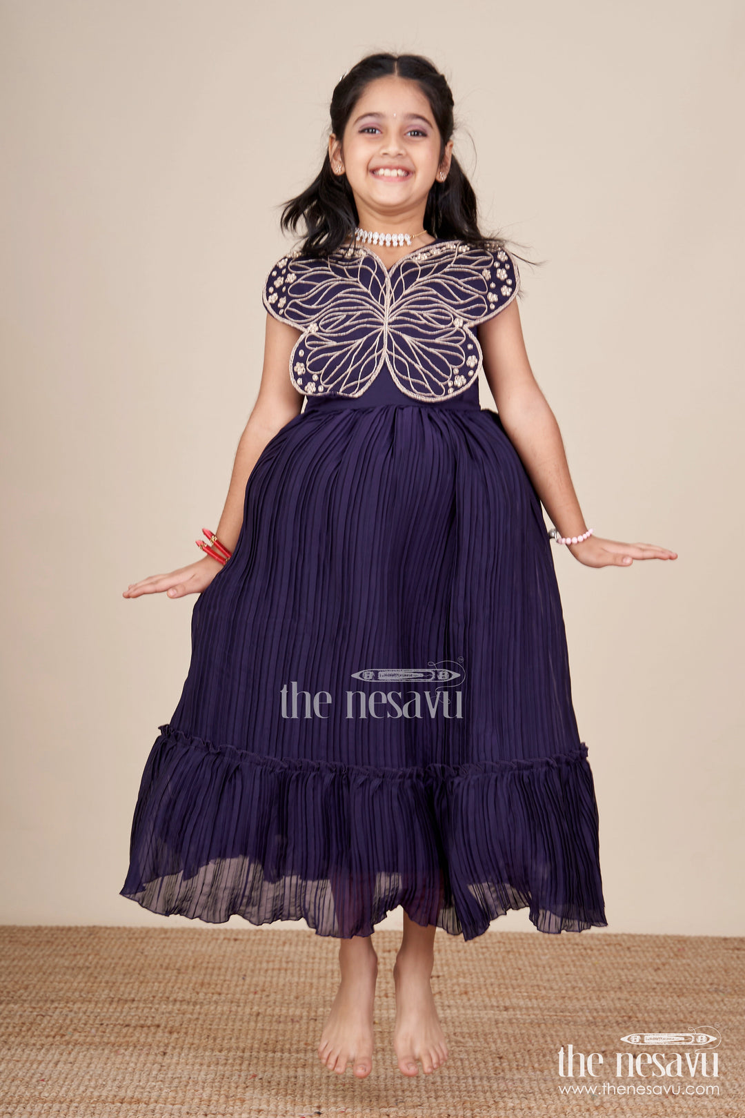 The Nesavu Girls Party Gown Girls Purple Party Gown with Butterfly Embellished Bodice Nesavu Nesavu girls purple georgette party gown butterfly embellished bodice birthdays weddings