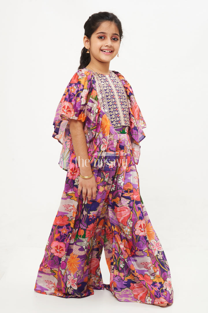 The Nesavu Girls Sharara / Plazo Set Girls' Purple Printed Chinon Silk Sharara Set with Embroidered Crop Top and Ruffle Sleeves Nesavu 24 (5Y) / multicolor GPS368B-24 Girls' Purple Floral Chinon Silk Sharara Set with Embroidered Crop Top - Festive Wear