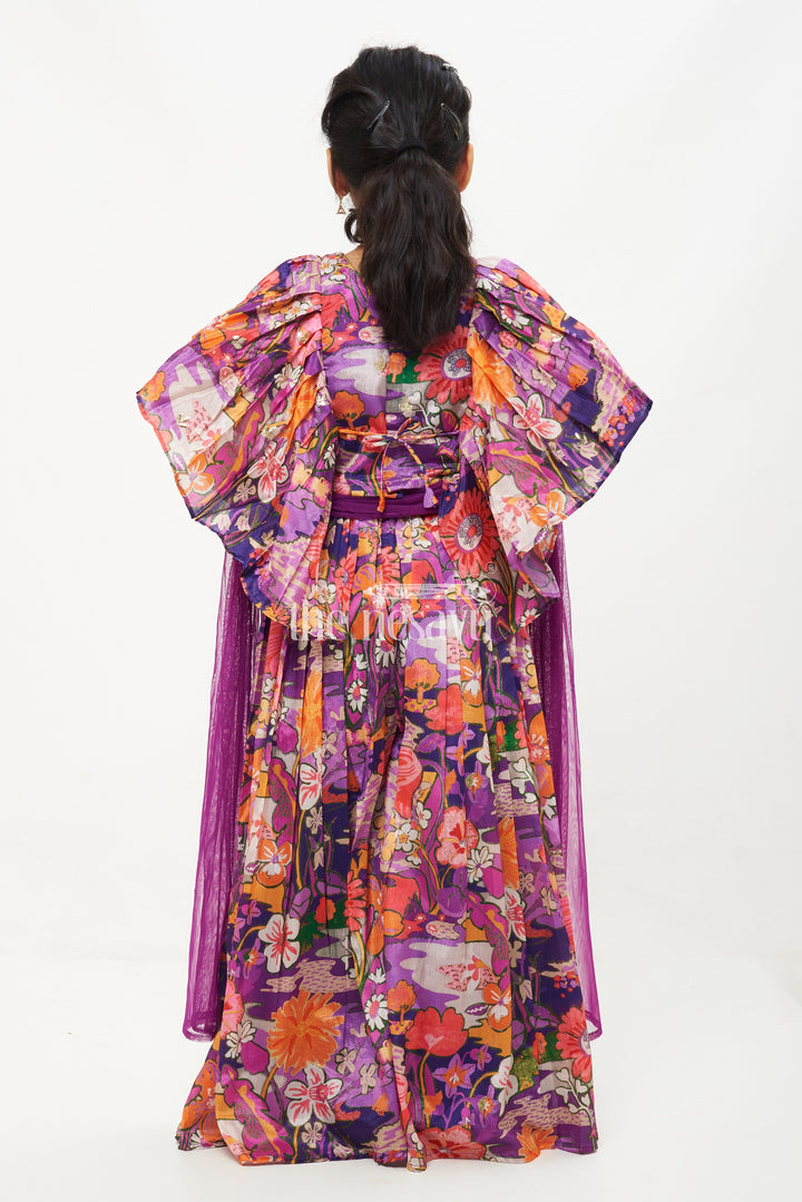 The Nesavu Girls Sharara / Plazo Set Girls' Purple Printed Chinon Silk Sharara Set with Embroidered Crop Top and Ruffle Sleeves Nesavu Girls' Purple Floral Chinon Silk Sharara Set with Embroidered Crop Top - Festive Wear