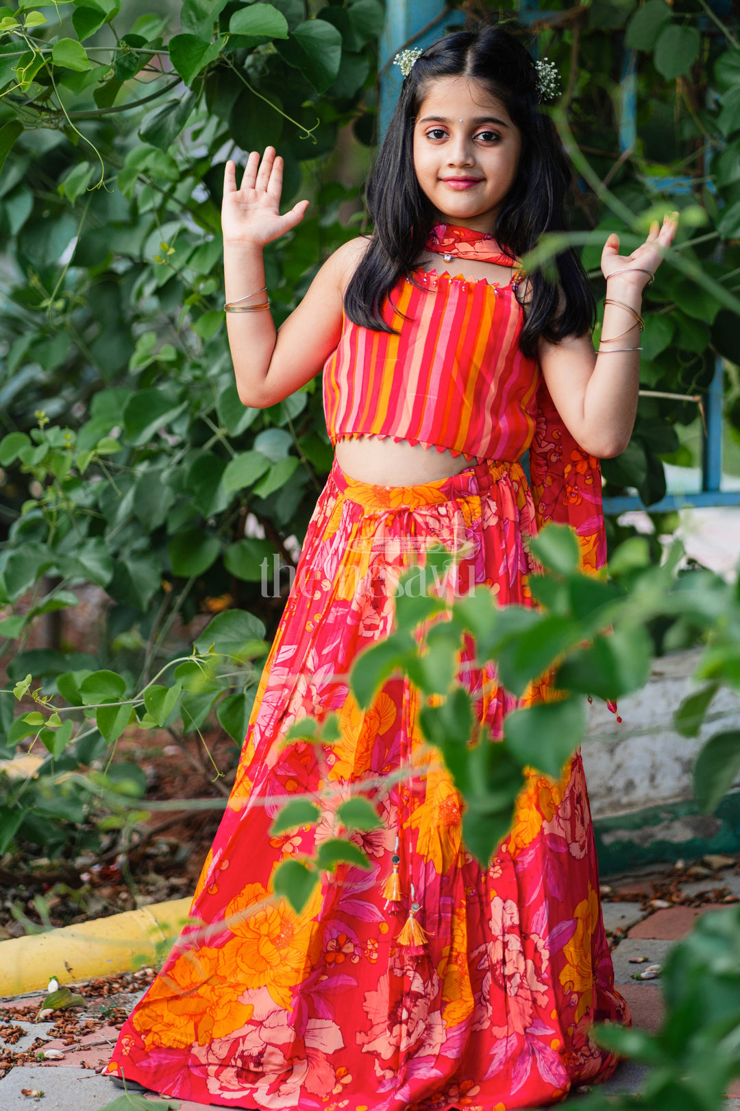 The Nesavu Girls Lehenga Choli Girls Red and Orange Lehenga Choli with Bold Floral Print and Striped Choli Top Nesavu 16 (1Y) / Orange GL488A-16 Nesavu Girls Red Orange Floral Lehenga Choli Striped Choli Top Dupatta