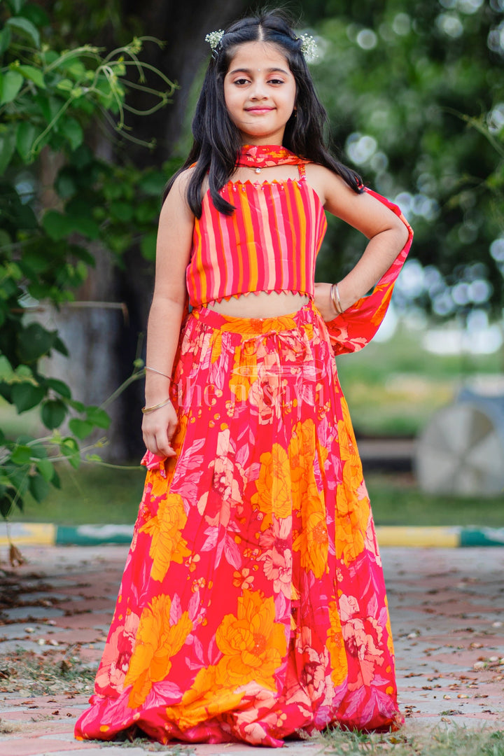 The Nesavu Girls Lehenga Choli Girls Red and Orange Lehenga Choli with Bold Floral Print and Striped Choli Top Nesavu Nesavu Girls Red Orange Floral Lehenga Choli Striped Choli Top Dupatta