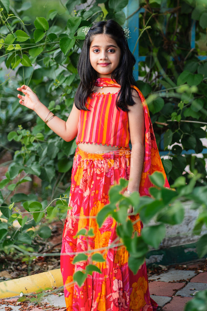 The Nesavu Girls Lehenga Choli Girls Red and Orange Lehenga Choli with Bold Floral Print and Striped Choli Top Nesavu Nesavu Girls Red Orange Floral Lehenga Choli Striped Choli Top Dupatta