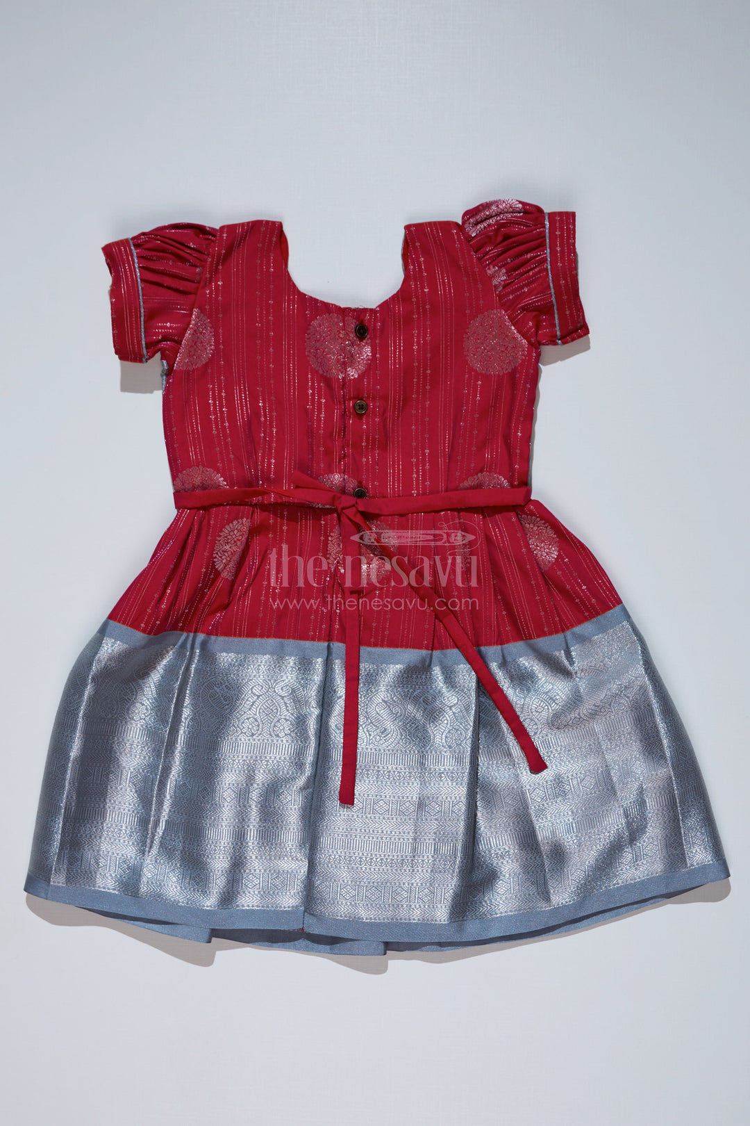 The Nesavu Girls Kanchi Silk Frock Girls Red and Silver Pattu Pavadai with Zari Border and Elegant Pleated Skirt Available Online Nesavu Girls Red Silver Pattu Pavadai Zari Border Elegant Pleated Skirt Online | The Nesavu