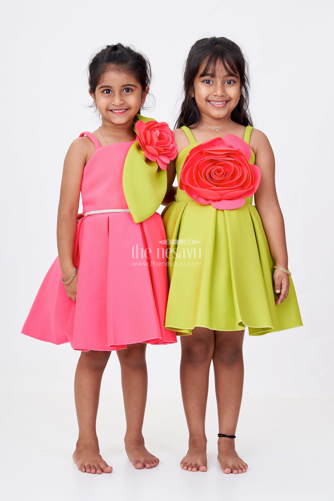 The Nesavu Girls Fancy Party Frock Girls Red Frock Party Wear in Pink Scuba Fabric with Floral Appliqué and Dramatic Green Leaf Accent Nesavu Girls Red Frock Party Wear Pink Scuba Floral Appliqu Green Leaf Accent Flared Skirt | The Nesavu