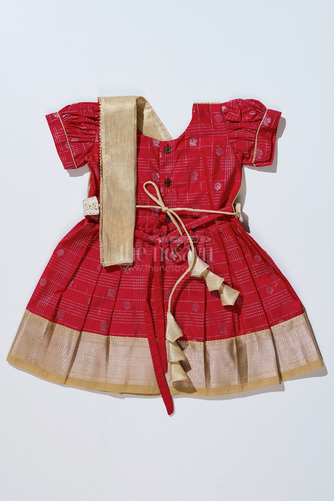 The Nesavu Girls Kanchi Silk Frock Girls Red Pattu Pavadai with Golden Zari Border and Pleated Design Available Online Nesavu Girls Red Pattu Pavadai Golden Zari Border Pleated Skirt Available Online | The Nesavu