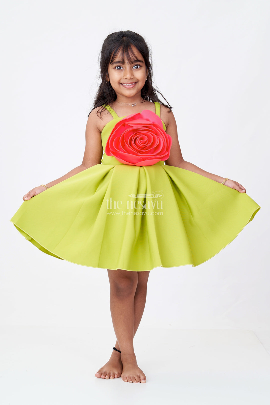 The Nesavu Girls Fancy Party Frock Girls Red Rose Flower Frock in Green Scuba Fabric with Oversized Floral Accent and Flowing Skirt Nesavu 16 (1Y) / Green PF210A-16 Nesavu Girls Red Rose Flower Frock Green Scuba Oversized Floral Detail Flared Pleated Skirt