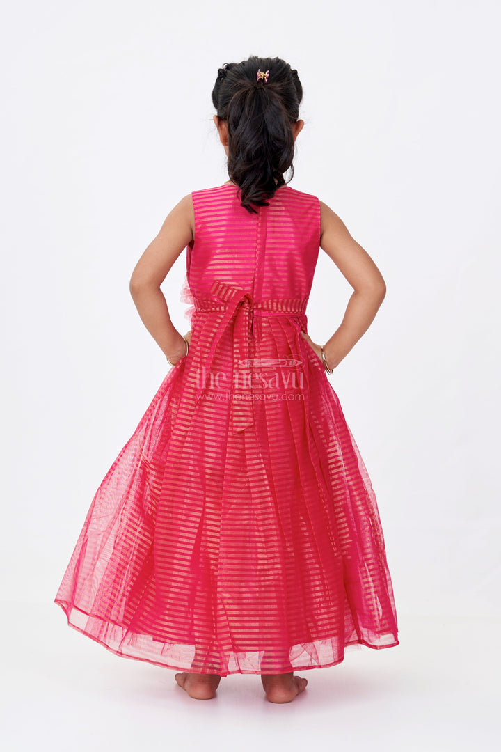 The Nesavu Girls Silk Gown Girls Red Silk Gown in Soft Net with Stripe Design and Oversized Floral Waist Embellishment Nesavu Girls Red Silk Gown Soft Net Gold Stripes Waist Flower Detail | The Nesavu