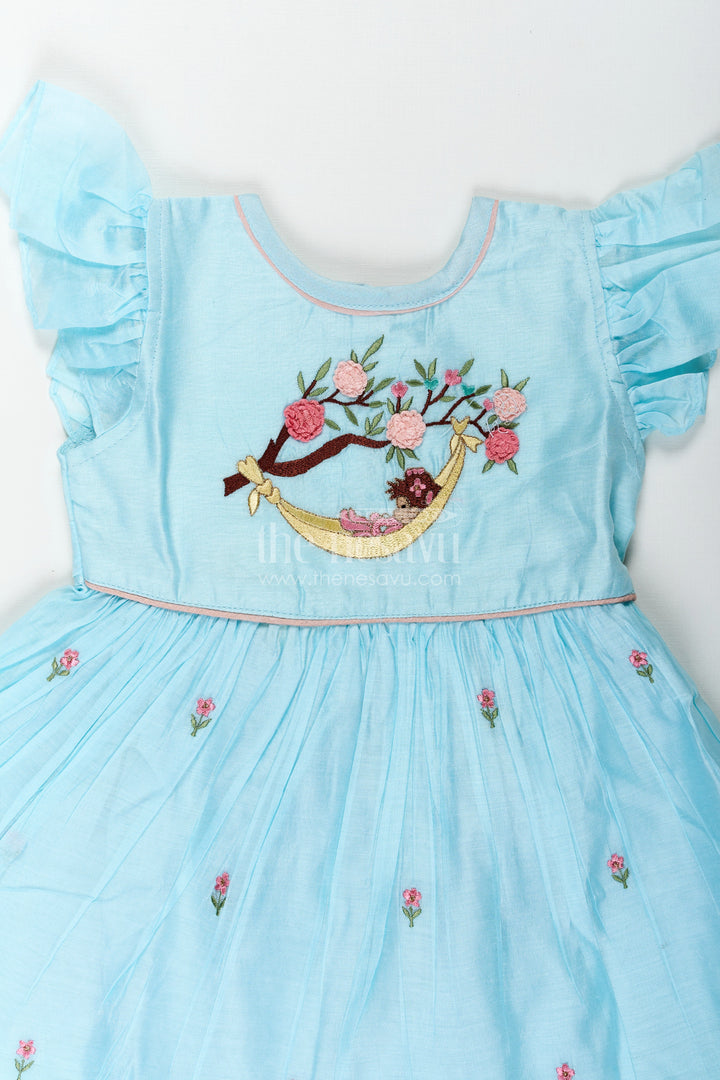 The Nesavu Girls Chanderi Frock Girls Ruffle Sleeves Long Frock in Chanderi with Thread Embroidery and Floral Motifs for Everyday Elegance Nesavu Girls Ruffle Sleeves Long Frock Chanderi Embroidered Floral Yoke Flared Hem | The Nesavu