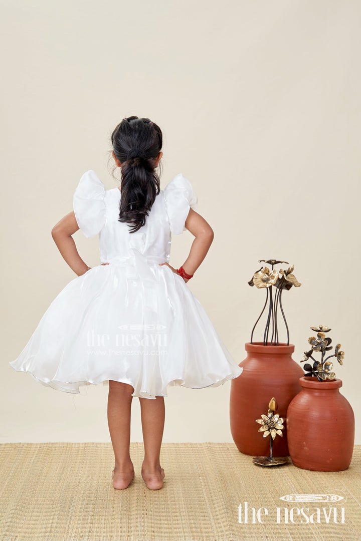 The Nesavu Girls Fancy Party Frock Girls Satin New Simple Frock Design with Puffy Sleeves and Oversized Floral Embellishment Nesavu Nesavu Girls White Satin Party Frock Puffy Sleeves Pink Flower new simple frock design