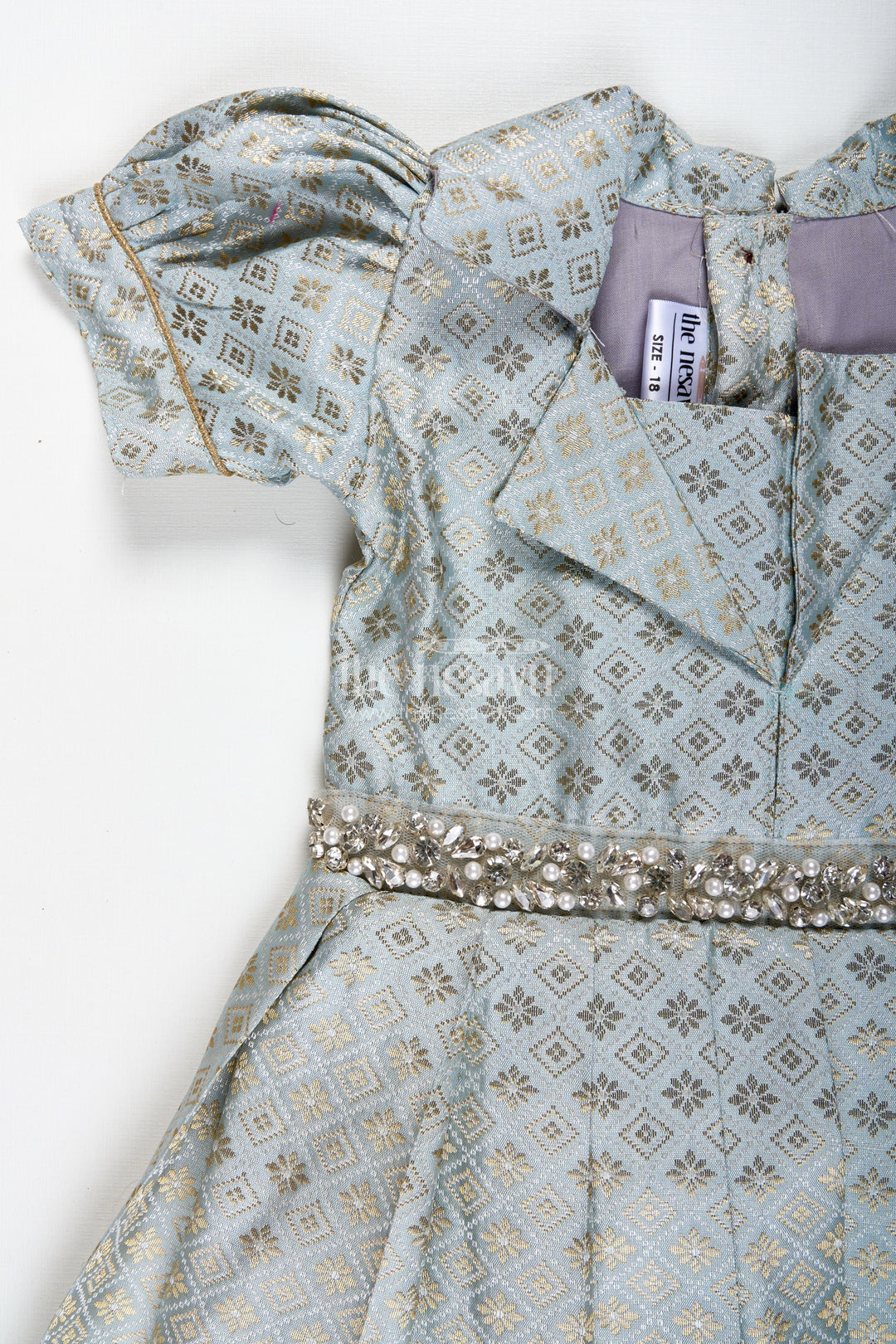 The Nesavu Girls Silk Gown Girls Semi Banaras Silk Gown with Collar Ethnic Grey and Gold Party Wear Nesavu Nesavu Semi Banaras Silk Gown Girls Grey Ethnic Party Wear Dress Collar Puff Sleeves