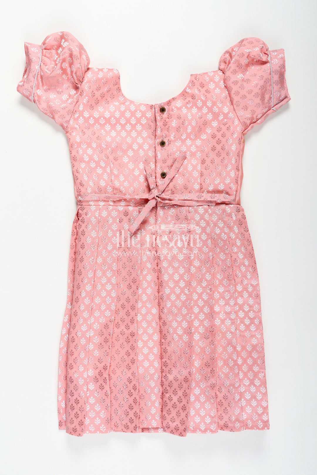 The Nesavu Girls Silk Gown Girls Semi Banaras Silk Pink Party Wear Gown with Intricate Woven Motifs and Classic Puff Sleeves Nesavu Girls Semi Banaras Silk Pink Party Wear Gown Floral Woven Design Puff Sleeves | The Nesavu