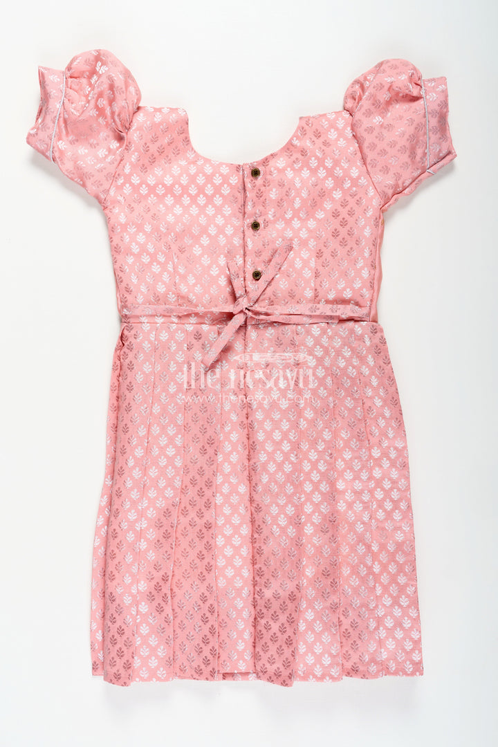 The Nesavu Girls Silk Gown Girls Semi Banaras Silk Pink Party Wear Gown with Intricate Woven Motifs and Classic Puff Sleeves Nesavu Girls Semi Banaras Silk Pink Party Wear Gown Floral Woven Design Puff Sleeves | The Nesavu