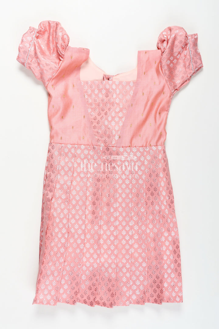 The Nesavu Girls Silk Gown Girls Semi Banaras Silk Pink Party Wear Gown with Intricate Woven Motifs and Classic Puff Sleeves Nesavu Girls Semi Banaras Silk Pink Party Wear Gown Floral Woven Design Puff Sleeves | The Nesavu