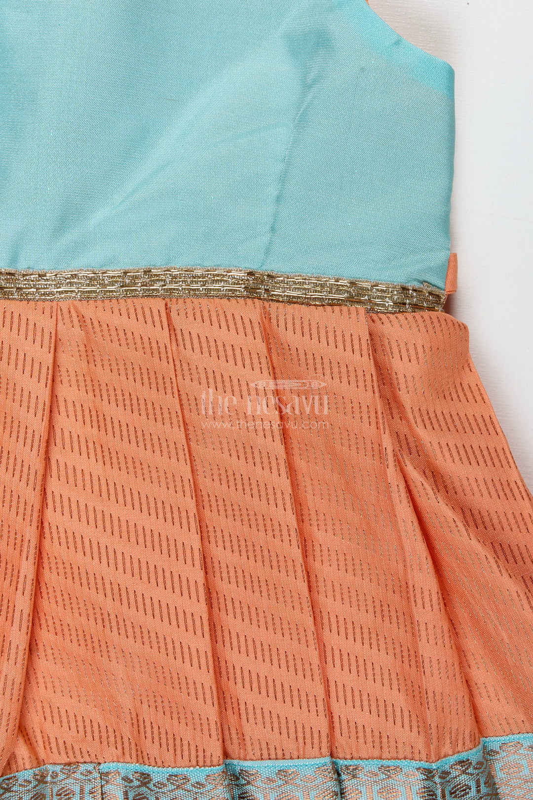 The Nesavu Tie-up Frock Girls Semi Kanchipuram Silk Tie-Up Frock in Grey-Orange Festive Traditional Wear Nesavu Semi Kanchipuram Silk Frock For Girls Grey And Orange Tie-Up Design