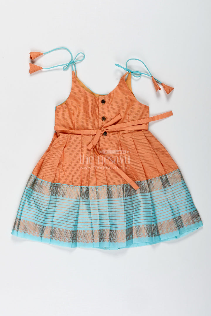 The Nesavu Tie-up Frock Girls Semi Kanchipuram Silk Tie-Up Frock in Grey-Orange Festive Traditional Wear Nesavu Semi Kanchipuram Silk Frock For Girls Grey And Orange Tie-Up Design