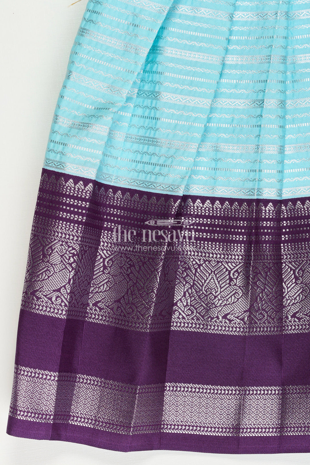 The Nesavu Girls Kanchi Silk Frock Girls Semi Kanchivaram Silk Frock with Layered Puff Sleeves and Contrast Borders in Pleated Dress Style Nesavu Nesavu Girls pleated dress Style Kanchi Silk Frock with Aqua Green Pleats and Purple Zari Borders
