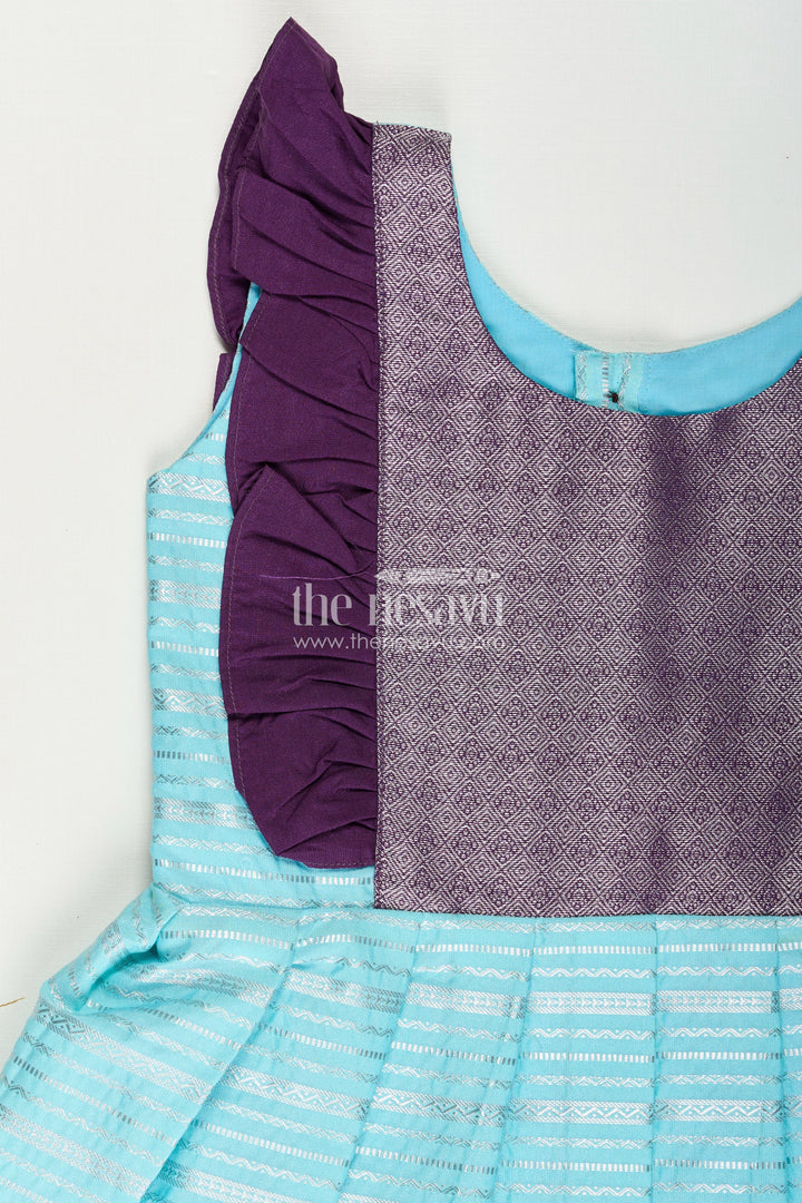 The Nesavu Girls Kanchi Silk Frock Girls Semi Kanchivaram Silk Frock with Layered Puff Sleeves and Contrast Borders in Pleated Dress Style Nesavu Nesavu Girls pleated dress Style Kanchi Silk Frock with Aqua Green Pleats and Purple Zari Borders