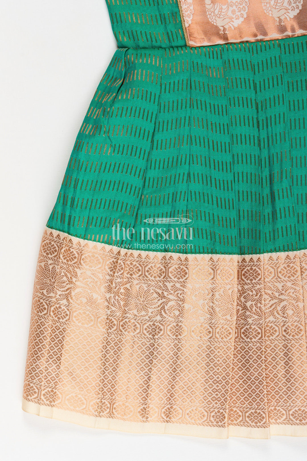 The Nesavu Girls Kanchi Silk Frock Girls Semi Kanchivaram Silk Frock with Puff Sleeves and Golden Zari Weave in Silk Green Design Nesavu Nesavu Girls Semi Kanchivaram Silk Frock in silk green Design with Zari Borders and Puff Sleeves