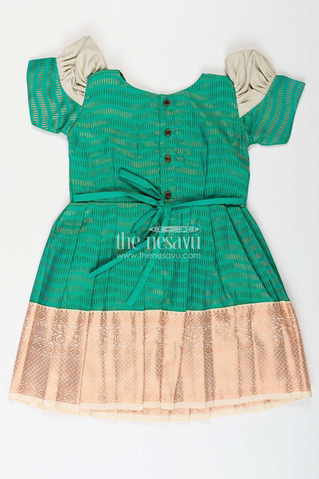 The Nesavu Girls Kanchi Silk Frock Girls Semi Kanchivaram Silk Frock with Puff Sleeves and Golden Zari Weave in Silk Green Design Nesavu Nesavu Girls Semi Kanchivaram Silk Frock in silk green Design with Zari Borders and Puff Sleeves