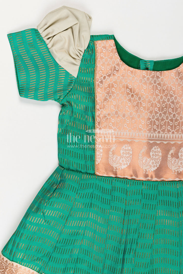 The Nesavu Girls Kanchi Silk Frock Girls Semi Kanchivaram Silk Frock with Puff Sleeves and Golden Zari Weave in Silk Green Design Nesavu Nesavu Girls Semi Kanchivaram Silk Frock in silk green Design with Zari Borders and Puff Sleeves