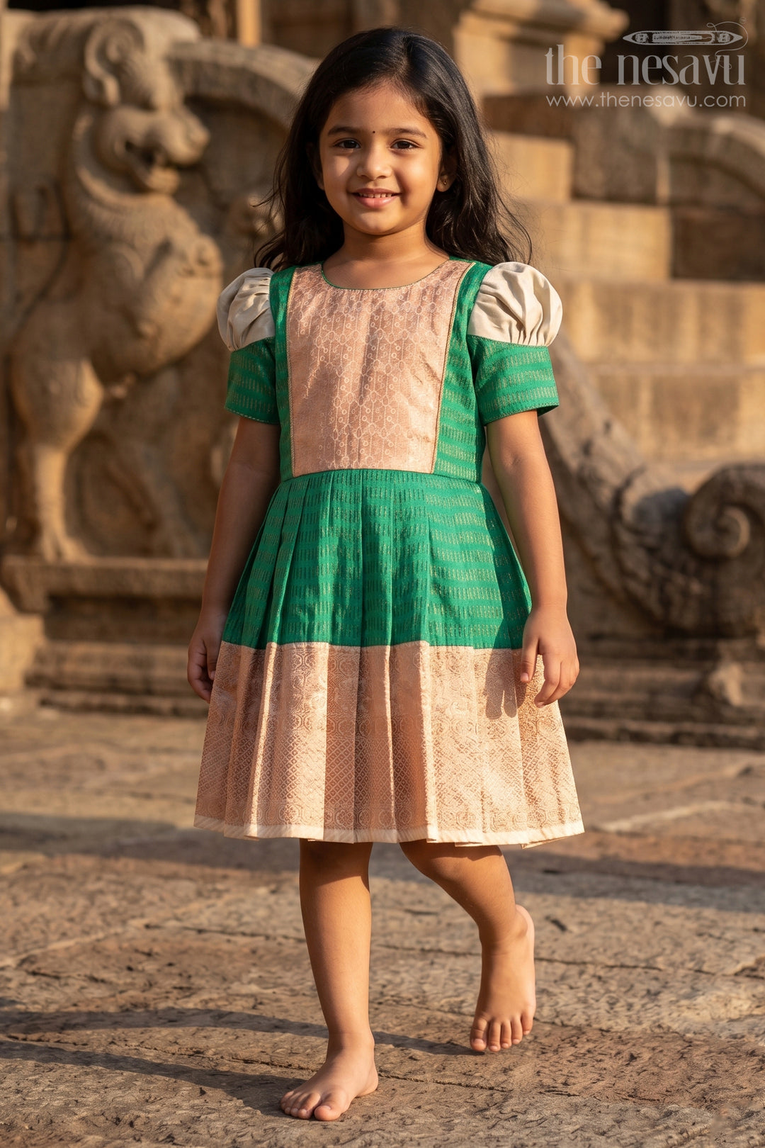 The Nesavu Girls Kanchi Silk Frock Girls Semi Kanchivaram Silk Frock with Puff Sleeves and Golden Zari Weave in Silk Green Design Nesavu Nesavu Girls Semi Kanchivaram Silk Frock in silk green Design with Zari Borders and Puff Sleeves