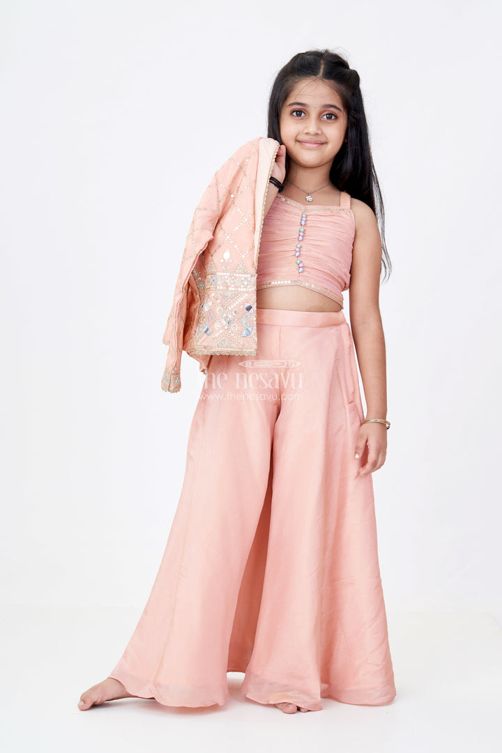 The Nesavu Girls Sharara / Plazo Set Girls Sharara Plazo Set with Embellished Jacket and Flowy Pants in Peach Nesavu Girls Peach Sharara Plazo Set Embellished Jacket Flowy Pants | The Nesavu