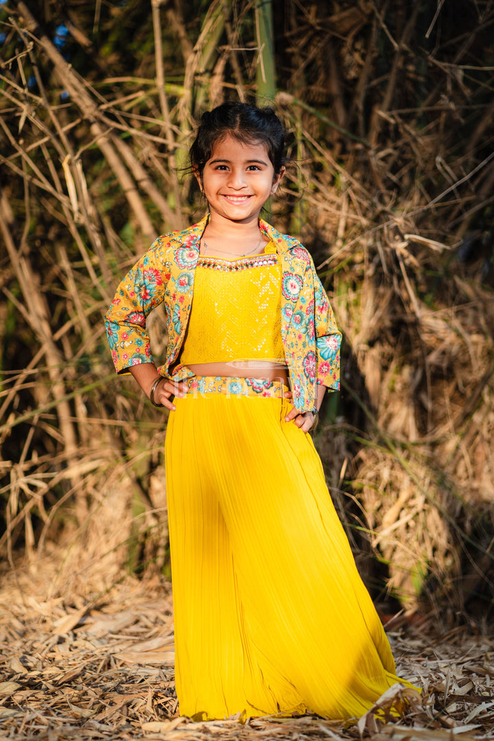 The Nesavu Girls Sharara / Plazo Set Girls Sharara Set in Vibrant Yellow with Floral-Printed Jacket and Palazzo Pants Nesavu Nesavu Girls Yellow Sharara Set Floral Jacket Pleated Palazzo Pants