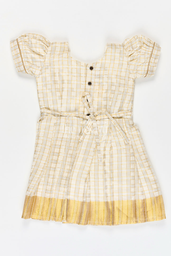 The Nesavu Silk Frock Girls Short Frocks for Party in Beige Silk with Gold Bow Embellishment and Checked Pleated Design Nesavu Nesavu Girls Short Frocks Party Beige Silk Gold Checked Pleats Bow Embellishment