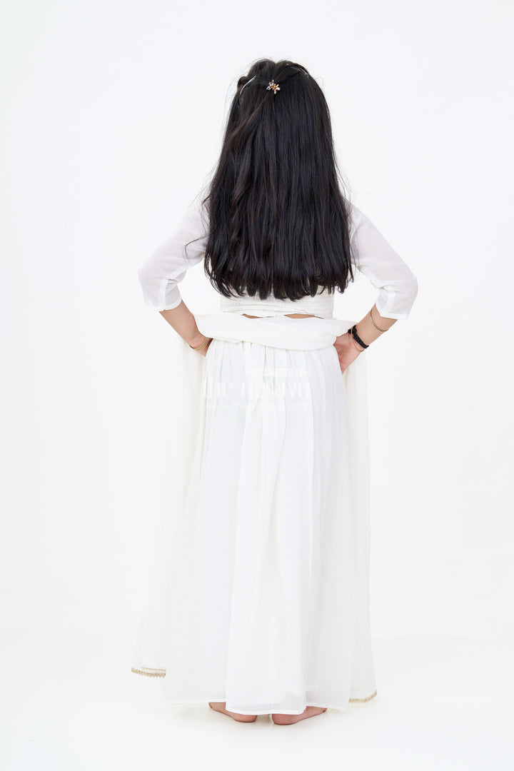 The Nesavu Girls Sharara / Plazo Set Girls Short Sharara Set in White with Embroidered Halter Neck and Layered Pants Nesavu Girls White Short Sharara Set Embroidered Halter Neck Blouse Pearl Tassels | The Nesavu