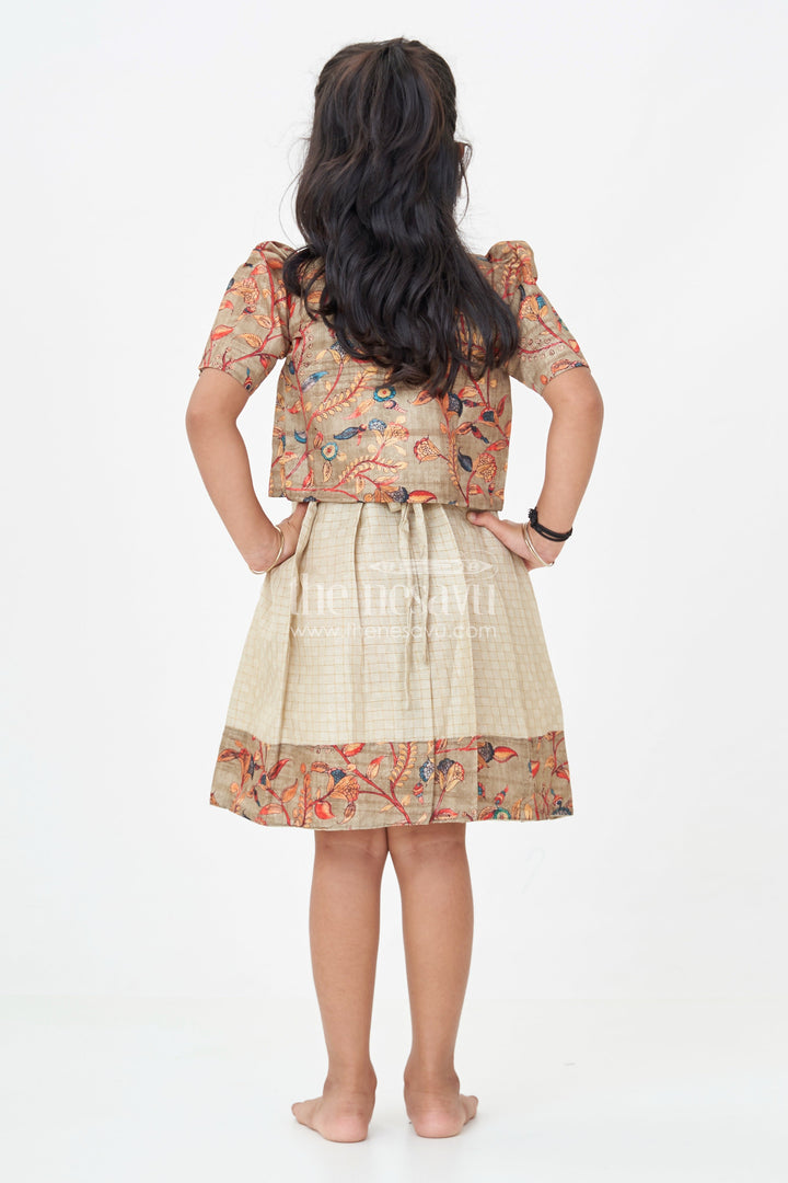 The Nesavu Silk Frock Girls Silk Cotton Frock with Frills and Printed Chanderi Overcoat in Earthy Beige and Multicolor Accents Nesavu Nesavu Girls Frock Frills Silk Cotton Chanderi Overcoat Featuring Floral Printed Borders