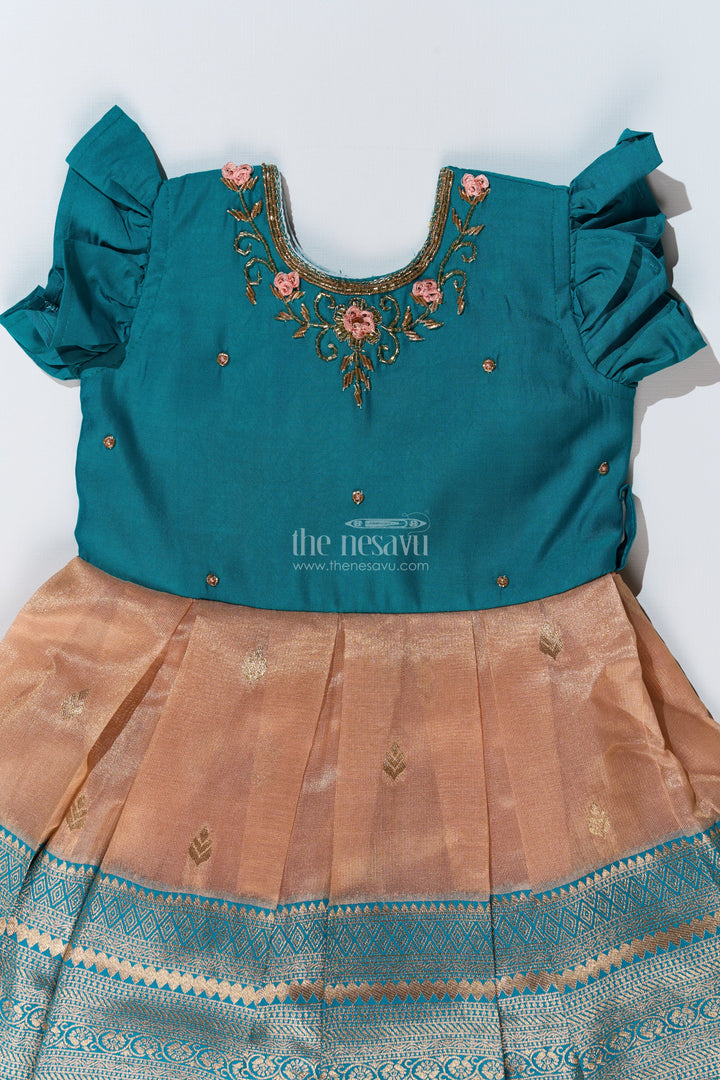 The Nesavu Silk Party Frock Girls Silk Saree to Frock with Traditional Zari Borders in Teal and Peach Nesavu Nesavu Girls Silk Saree to Frock Teal Peach Zari Border Design