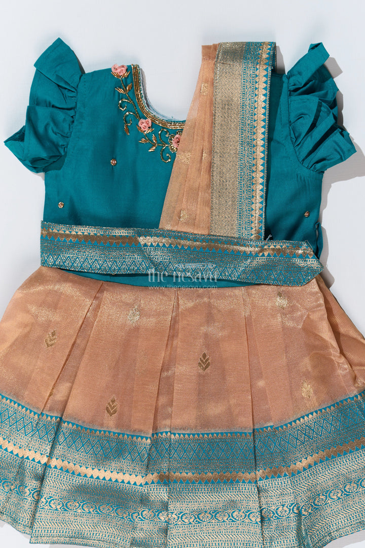 The Nesavu Silk Party Frock Girls Silk Saree to Frock with Traditional Zari Borders in Teal and Peach Nesavu Nesavu Girls Silk Saree to Frock Teal Peach Zari Border Design