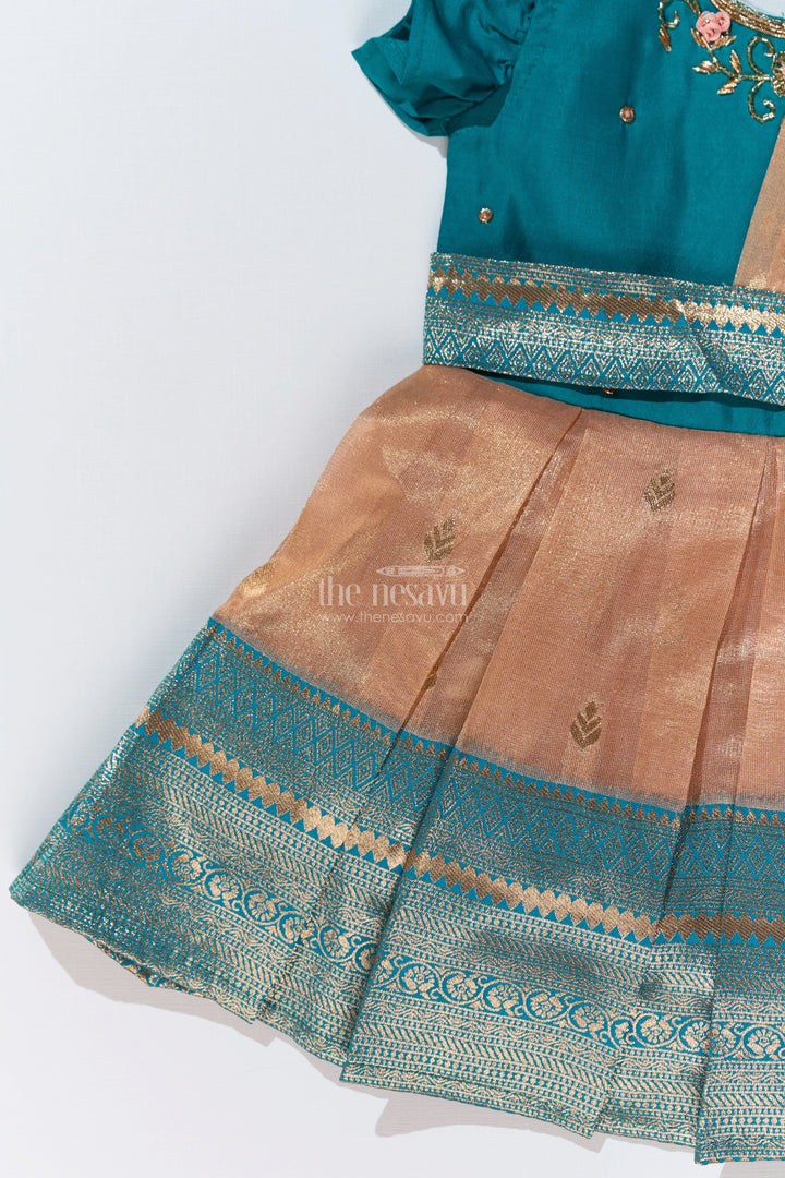 The Nesavu Silk Party Frock Girls Silk Saree to Frock with Traditional Zari Borders in Teal and Peach Nesavu Nesavu Girls Silk Saree to Frock Teal Peach Zari Border Design