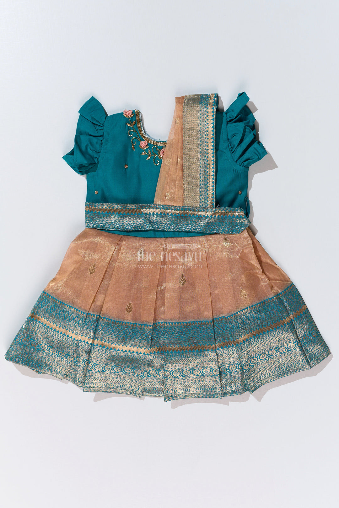 The Nesavu Silk Party Frock Girls Silk Saree to Frock with Traditional Zari Borders in Teal and Peach Nesavu Nesavu Girls Silk Saree to Frock Teal Peach Zari Border Design