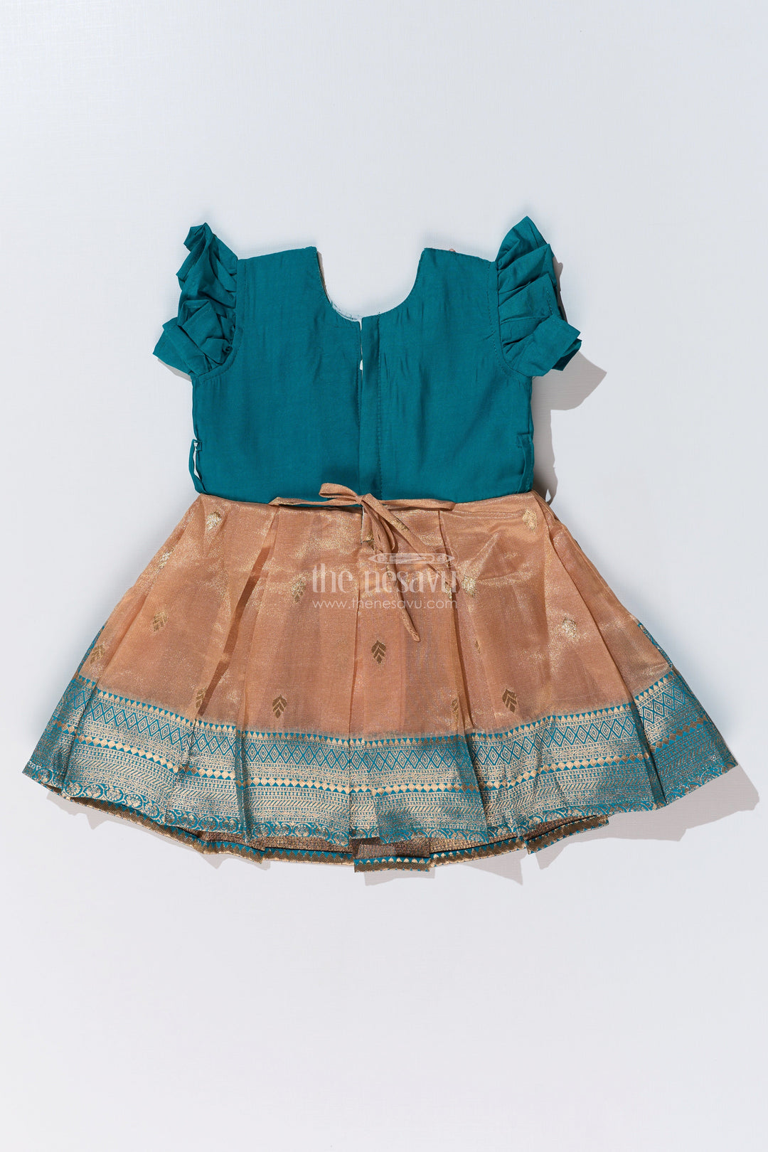 The Nesavu Silk Party Frock Girls Silk Saree to Frock with Traditional Zari Borders in Teal and Peach Nesavu Nesavu Girls Silk Saree to Frock Teal Peach Zari Border Design