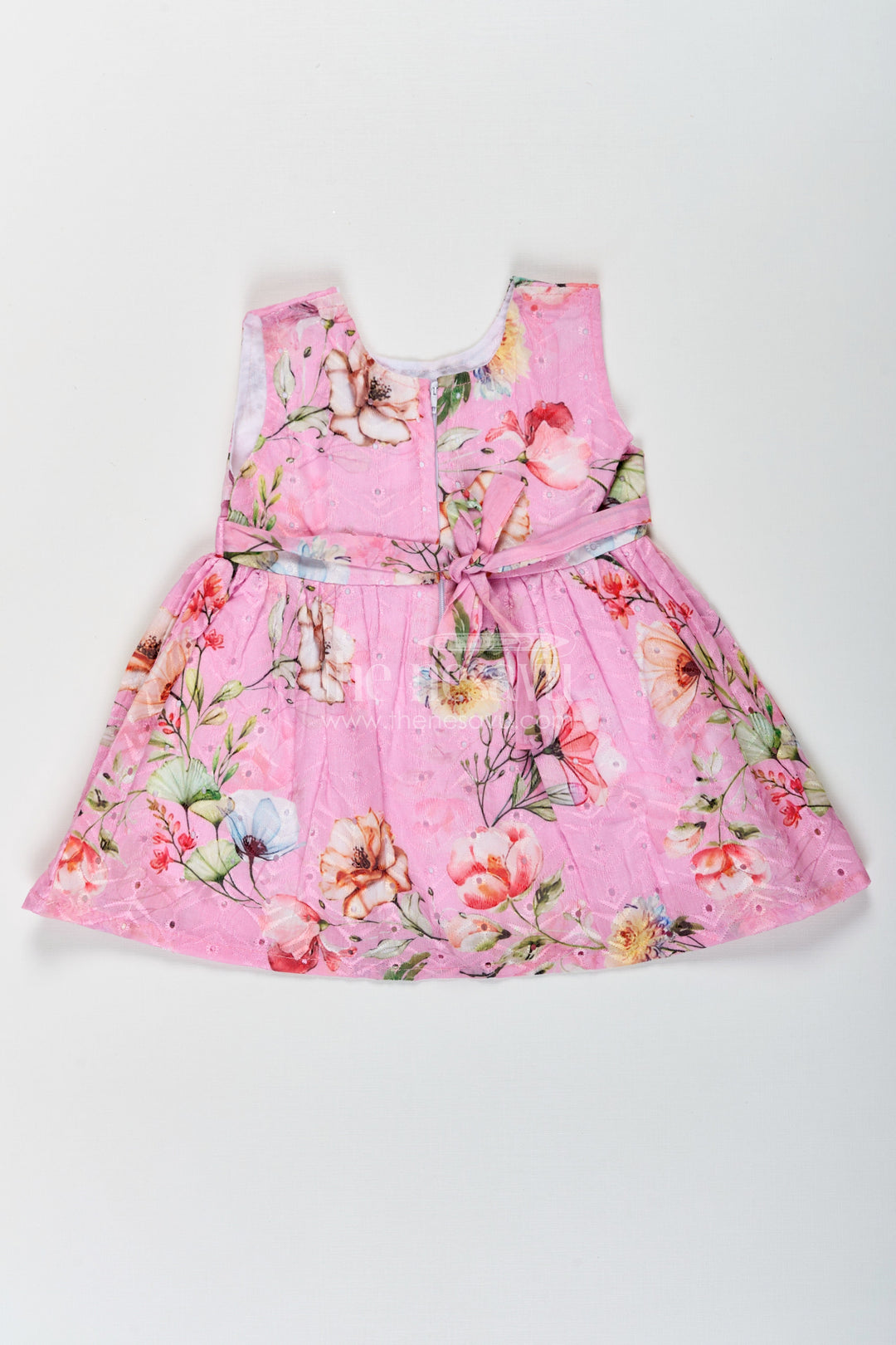 The Nesavu Baby Cotton Frocks Girls Sleeveless Flower Frock in Hakoba Cotton with Multicolor Floral Print and Soft Pink Base Nesavu Sleeveless Flower Frock Girls Hakoba Cotton Pink Multicolor Floral Print | The Nesavu