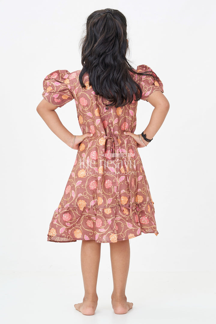 The Nesavu Girls Fancy Frock Girls Sleeves Design Frock in Brown Muslin Silk with Floral Print and Gathered Hem for Everyday Charm Nesavu Nesavu Girls Brown Muslin Silk Sleeves Design Frock Floral Digital Print Ruffle Hem