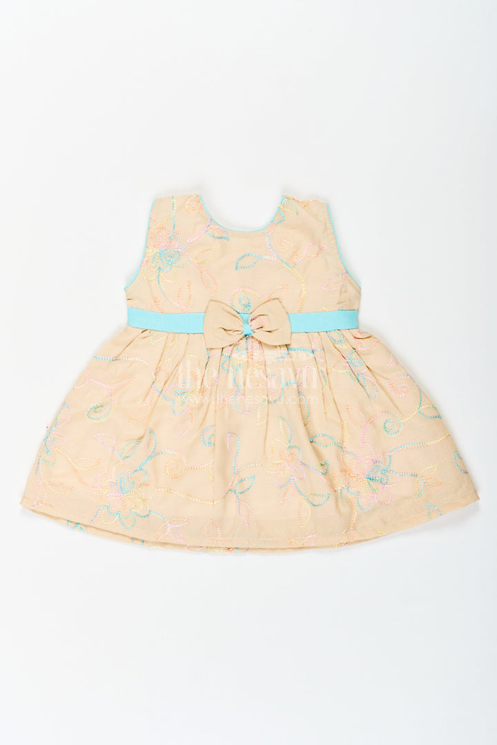 The Nesavu Baby Cotton Frocks Girls Stylish Cotton Frock with Multicolor Floral Embroidery and Aqua Waist Bow for Everyday Charm Nesavu 14 (6M) / Beige BFJ754B-14 Stylish Cotton Frock Girls Multicolor Floral Embroidery Aqua Bow Accent | The Nesavu