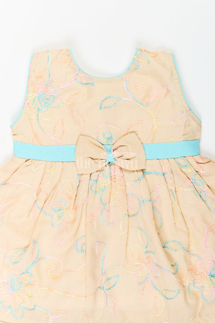 The Nesavu Baby Cotton Frocks Girls Stylish Cotton Frock with Multicolor Floral Embroidery and Aqua Waist Bow for Everyday Charm Nesavu Stylish Cotton Frock Girls Multicolor Floral Embroidery Aqua Bow Accent | The Nesavu