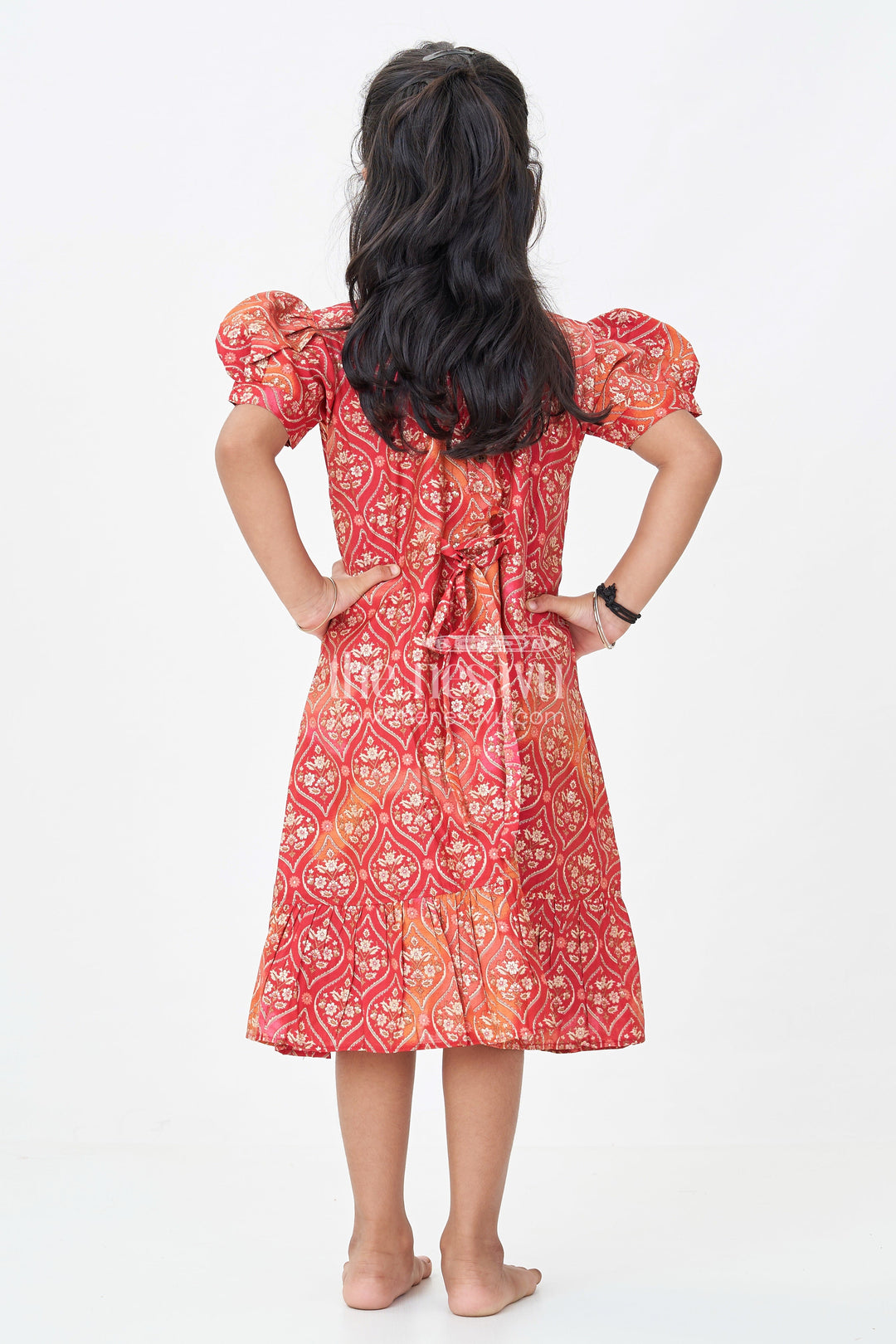 The Nesavu Girls Fancy Frock Girls Stylish Frock Design in Red Modal Silk with Ornamental Motifs and Ruffle Hem for Classic Vibes Nesavu Nesavu Girls Stylish Red Frock Design Modal Silk Puff Sleeves Ruffle Trim Hem