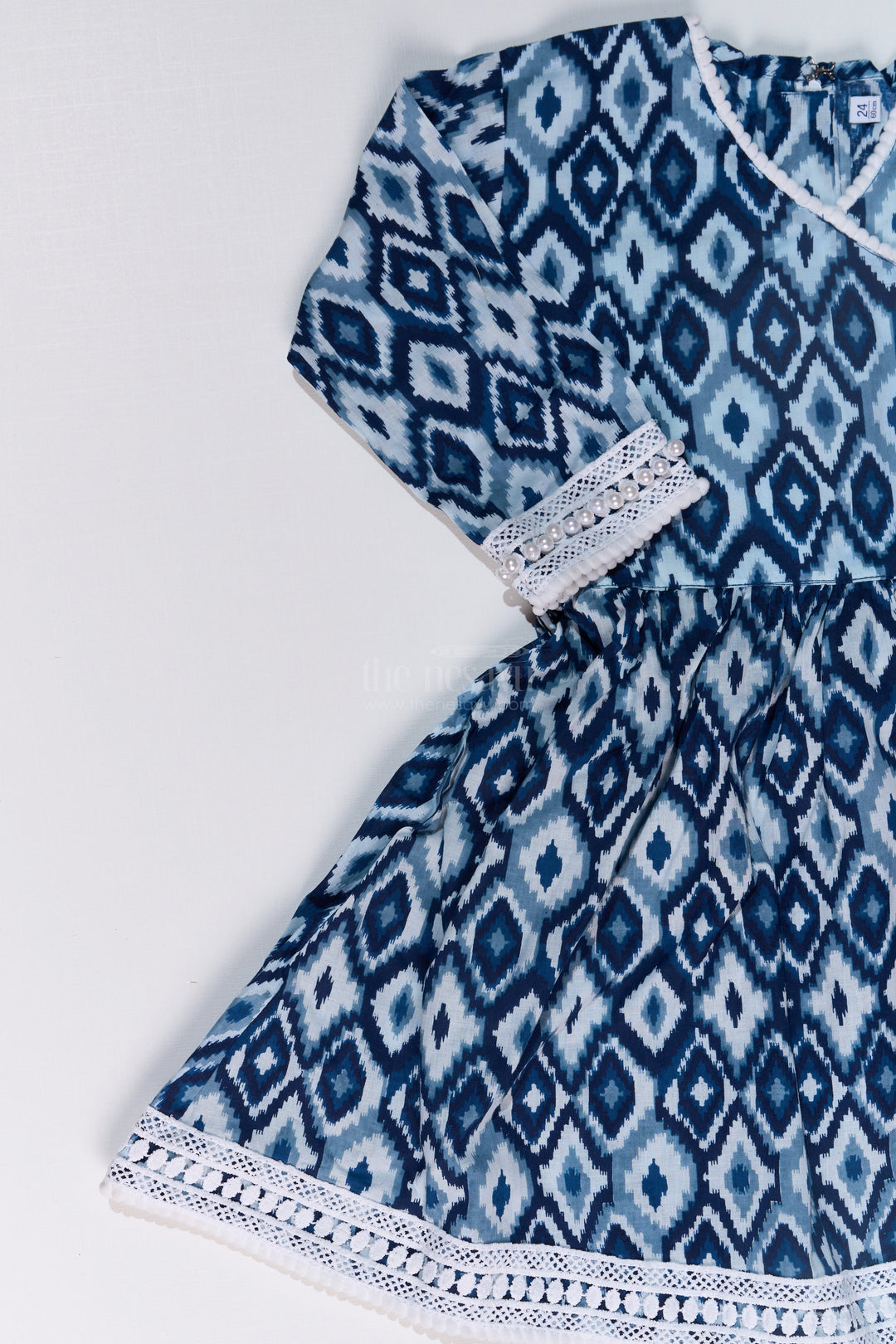 The Nesavu Girls Sharara / Plazo Set Girls Suit Plazo Set with Ikat Inspired Print and Pom-Pom Detailing in Blue and White Nesavu Girls Blue White Suit Plazo Set Ikat Inspired Print Pom-Pom Detailing | The Nesavu