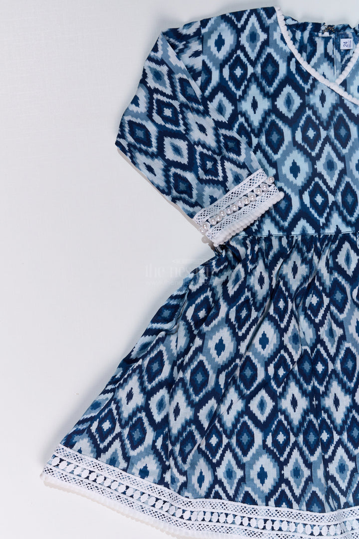 The Nesavu Girls Sharara / Plazo Set Girls Suit Plazo Set with Ikat Inspired Print and Pom-Pom Detailing in Blue and White Nesavu Girls Blue White Suit Plazo Set Ikat Inspired Print Pom-Pom Detailing | The Nesavu
