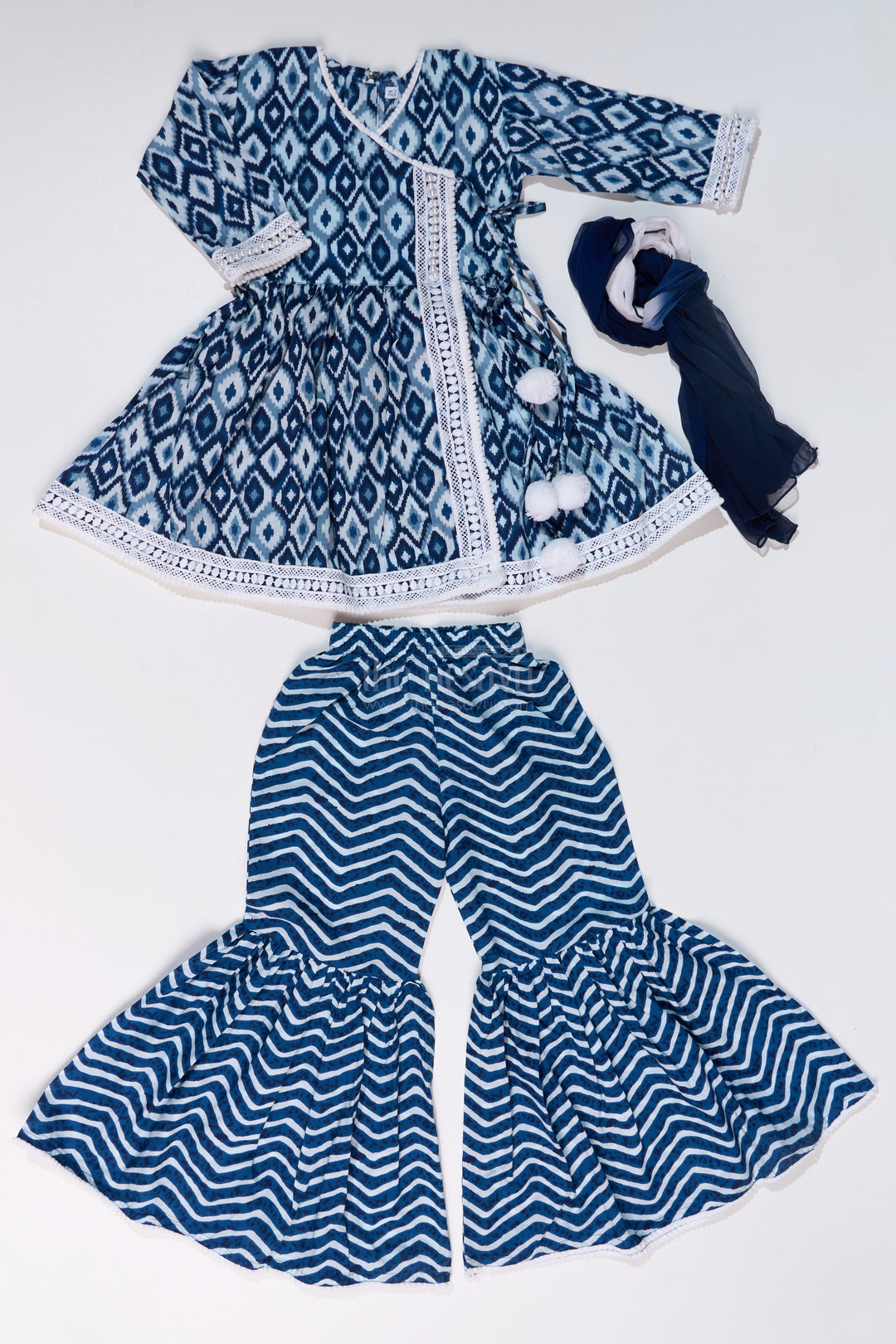 The Nesavu Girls Sharara / Plazo Set Girls Suit Plazo Set with Ikat Inspired Print and Pom-Pom Detailing in Blue and White Nesavu Girls Blue White Suit Plazo Set Ikat Inspired Print Pom-Pom Detailing | The Nesavu