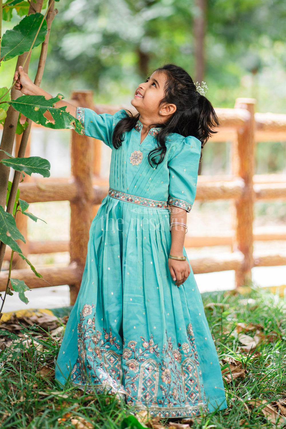 The Nesavu Girls Party Gown Girls Teal Party Gown with Intricate Embroidery and Floral Borders for Special Occasions Nesavu Nesavu Girls Teal Blue Embroidered Party Gown Floral Borders Weddings Formal Events