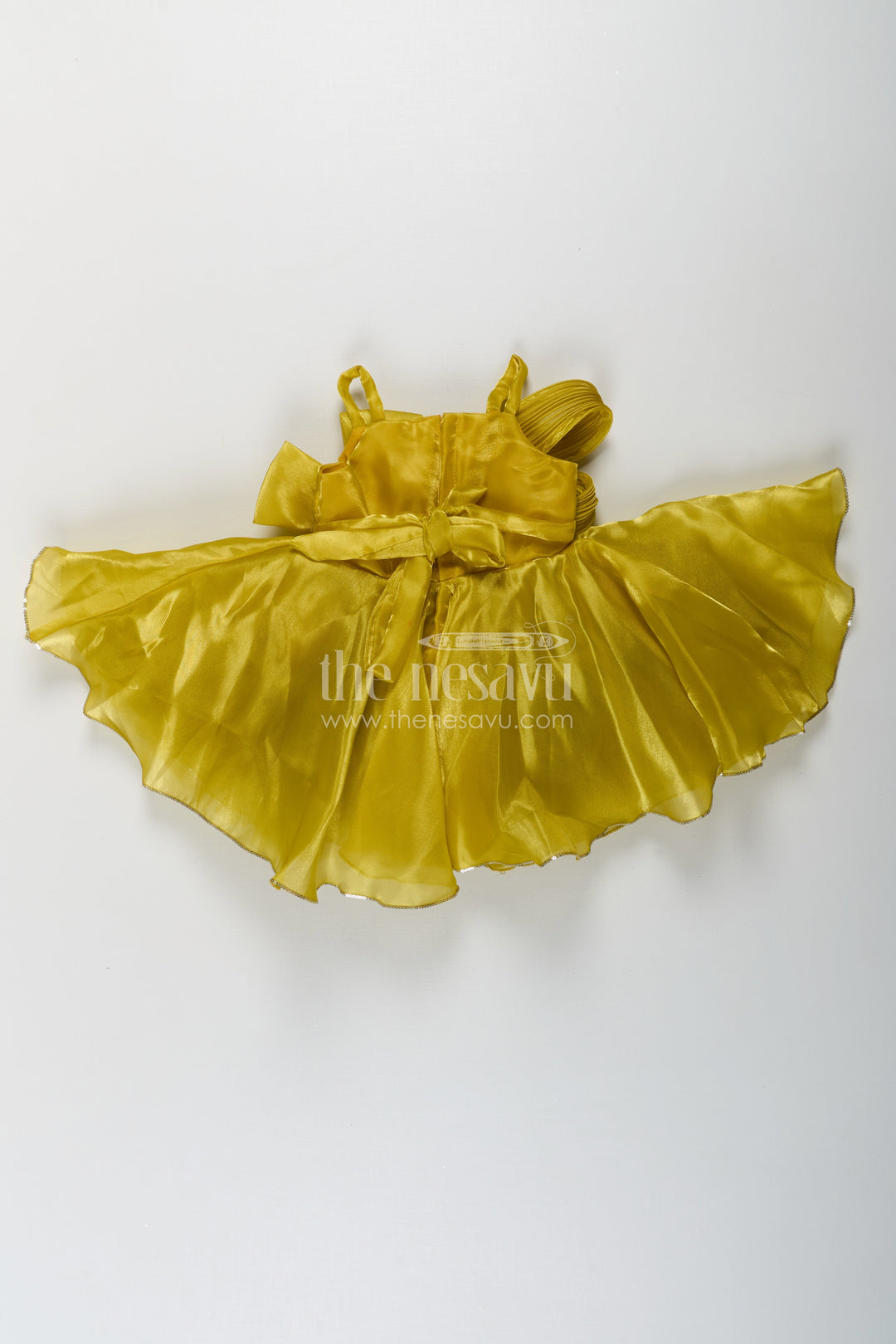 The Nesavu Girls Fancy Party Frock Girls Trendy Frock in Glossy Satin with Floral Waist Embellishment and Flowy Asymmetrical Hem Nesavu Girls Trendy Frock Glossy Satin Flowy Hem Floral Bow Embellishment | The Nesavu